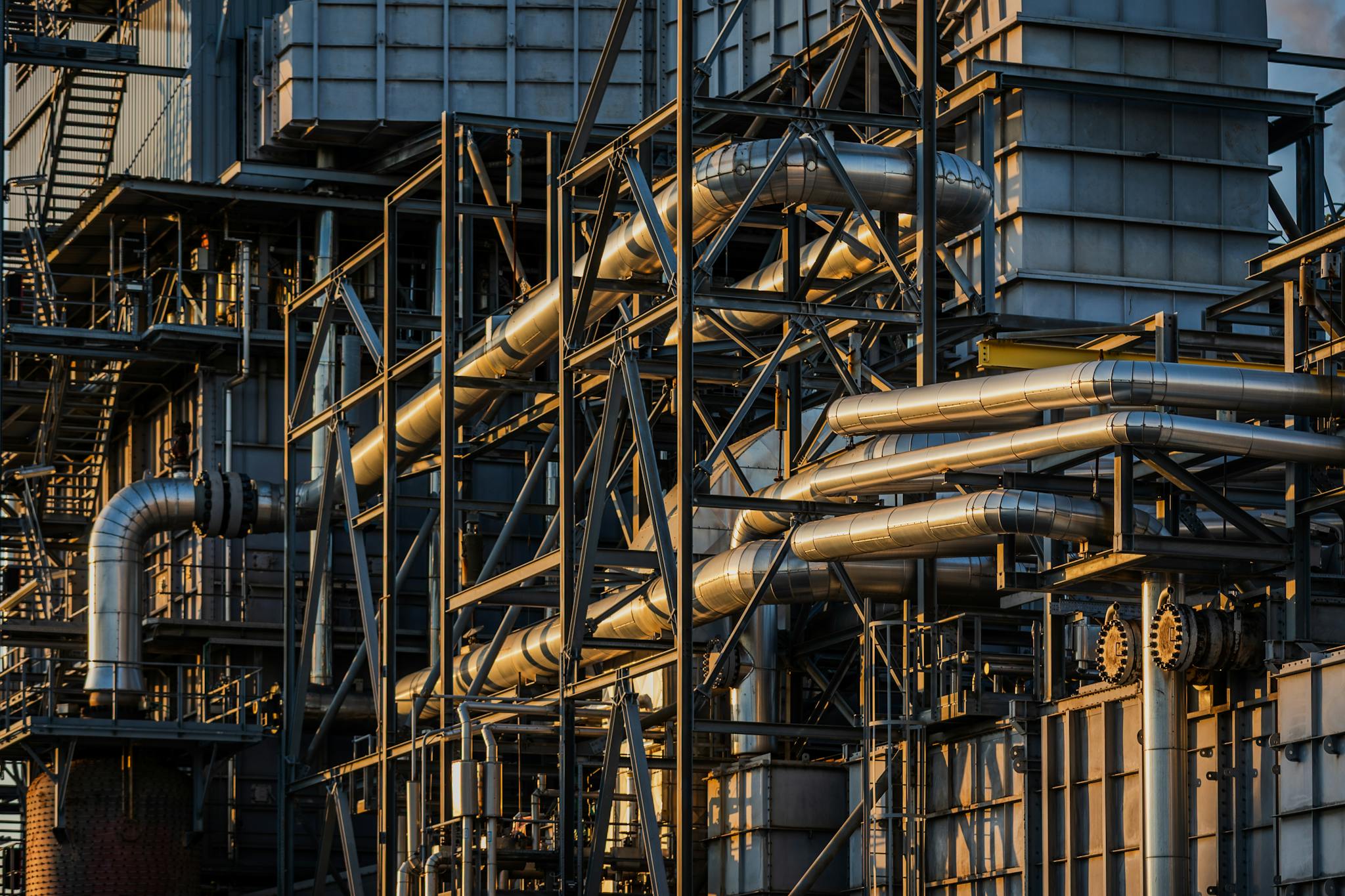 Detailed industrial scene of structures and pipes at Botlek Rotterdam, capturing the intricate design.